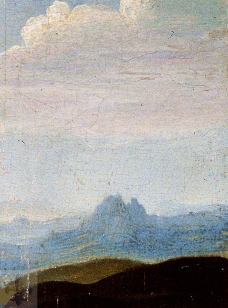 Dettaglio del paesaggio montano nella Madonna Litta di Leonardo da Vinci, evidenziando la prospettiva aerea.